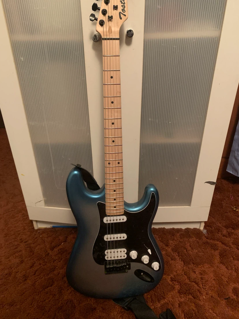 Metallic blue electric guitar