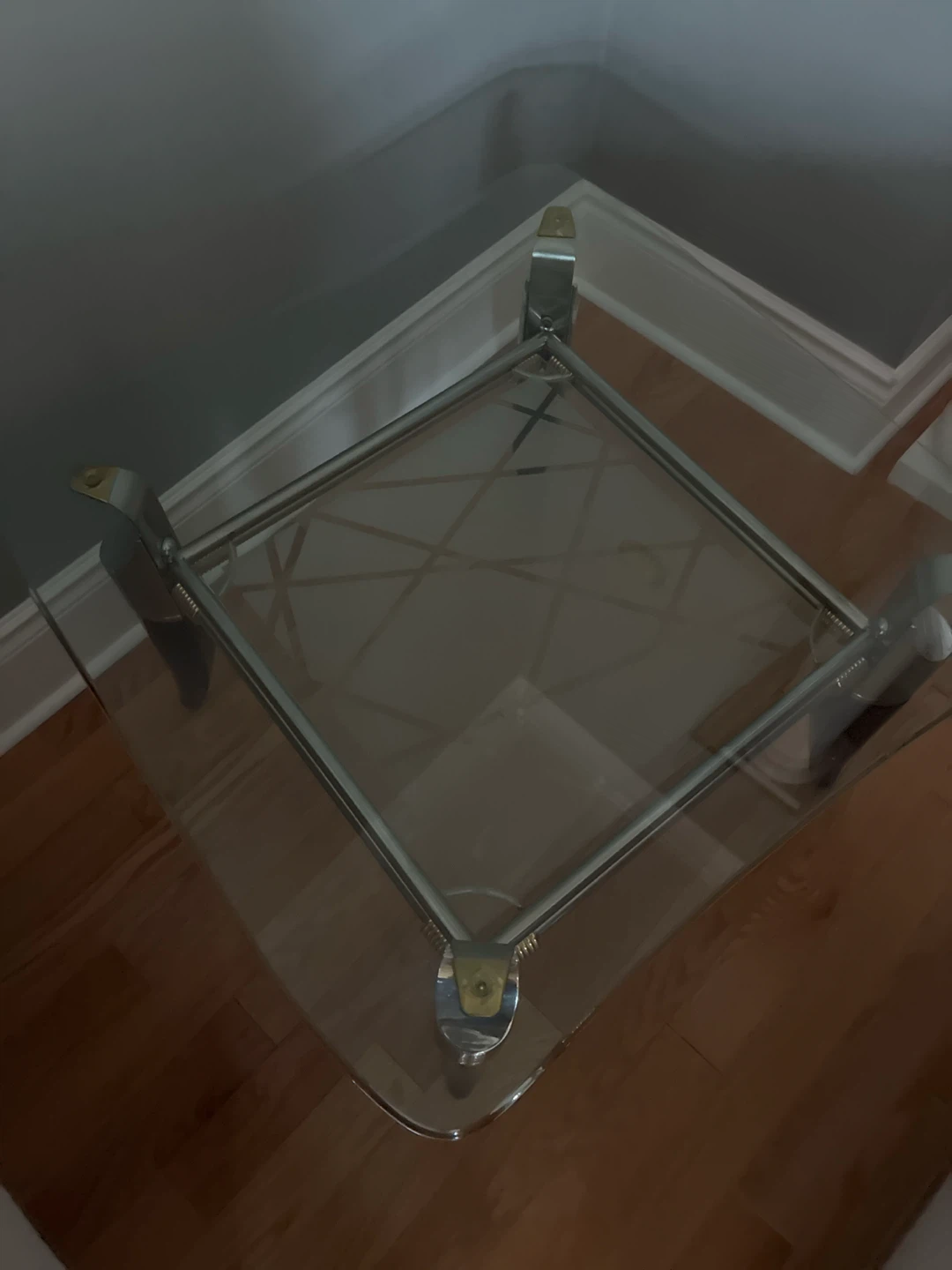 Glass top coffee table with chrome and wood legs - photo 3