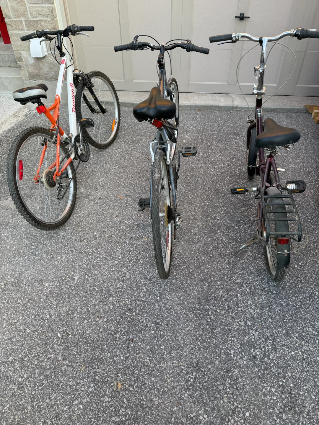Trio of Bicycles - Schwinn, Supercycle, and Triumph