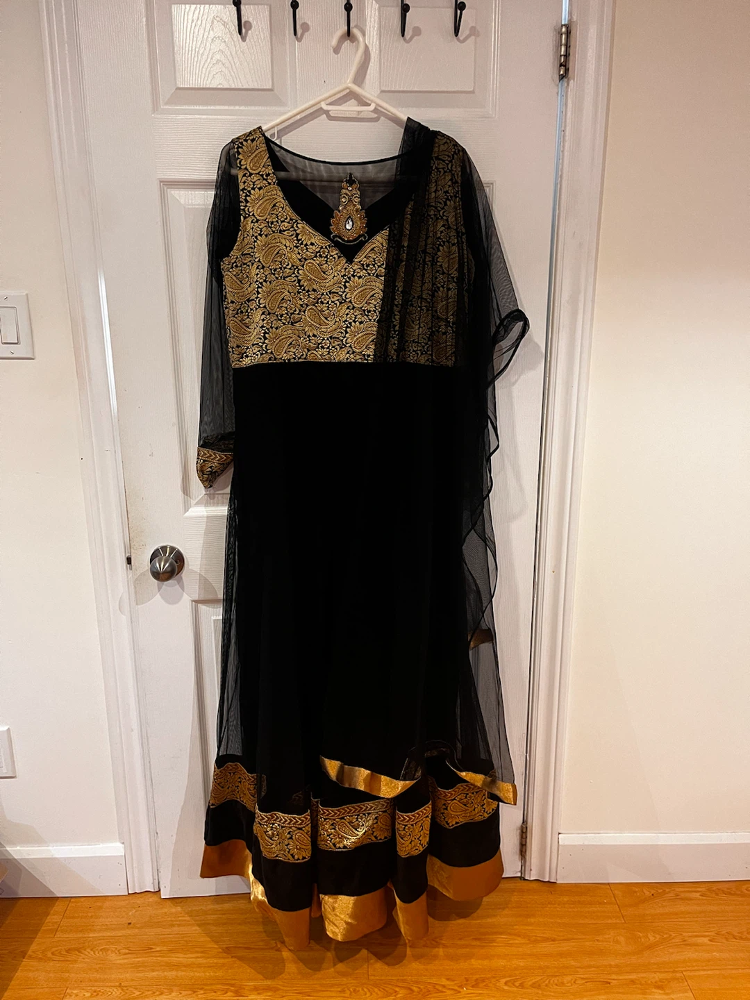 Floor-length black and gold Anarkali gown