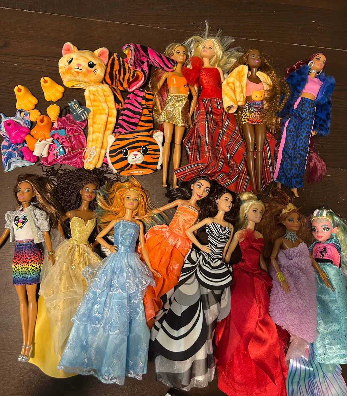 12 Barbie Dolls and Accessorie