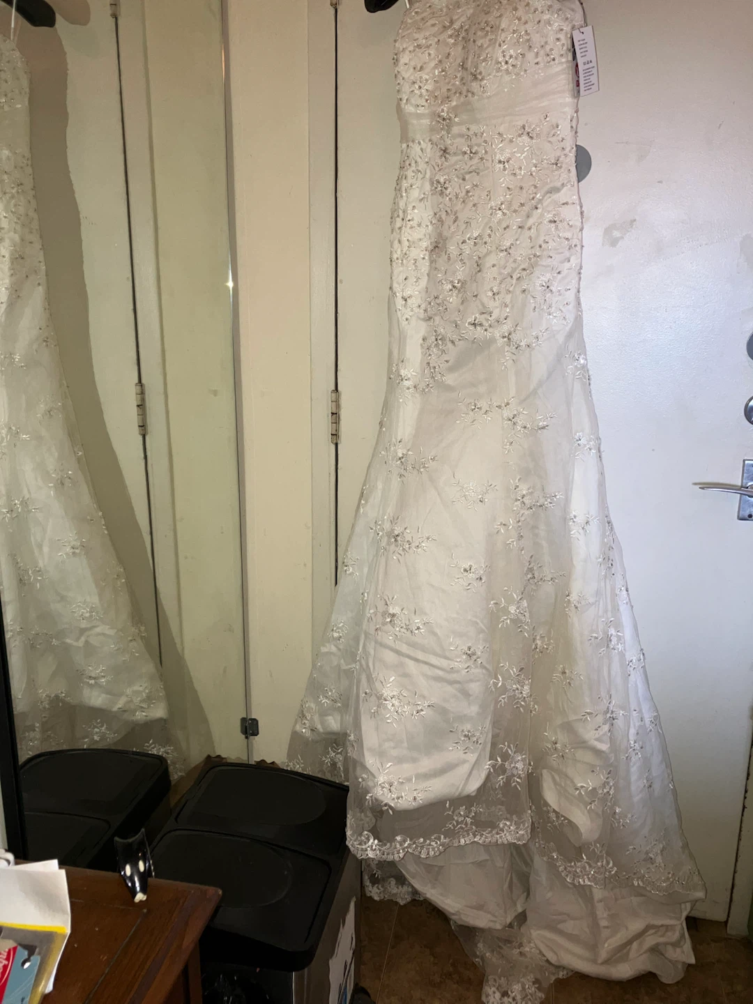White strapless wedding dress with bead and lace embellishments