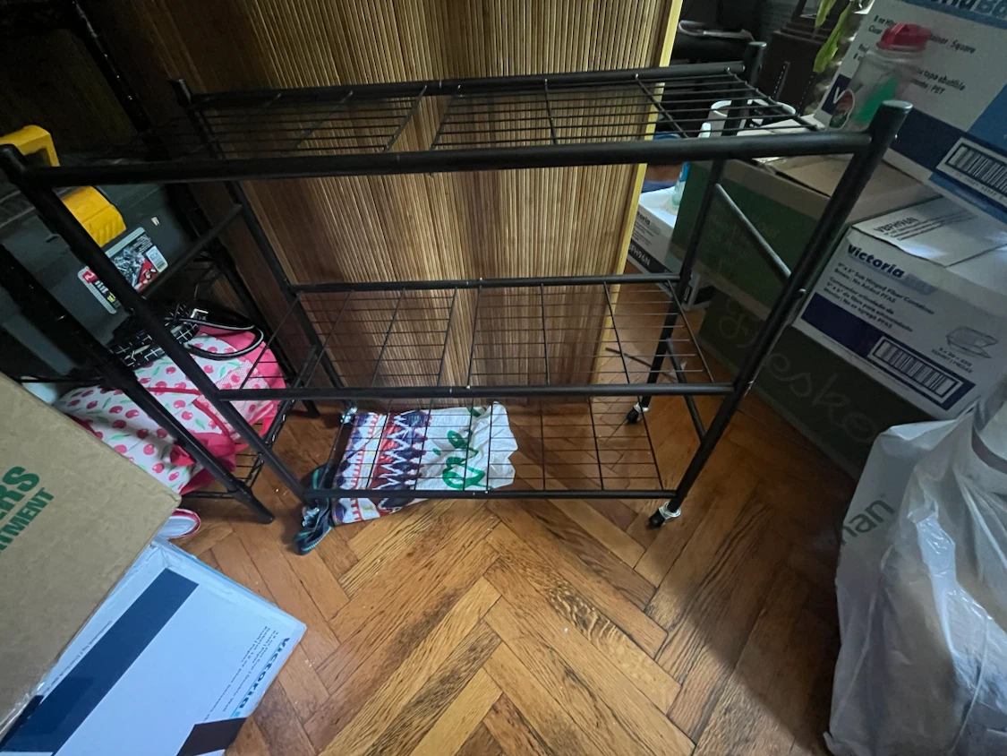 Metal shelf with wheels