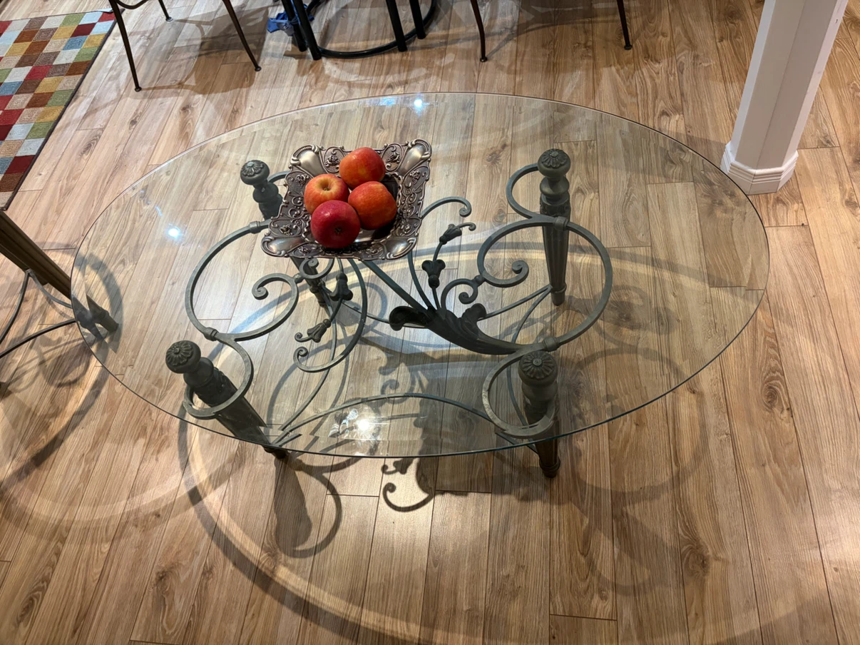 Oval Glass Coffee Table with Ornate Metal Base