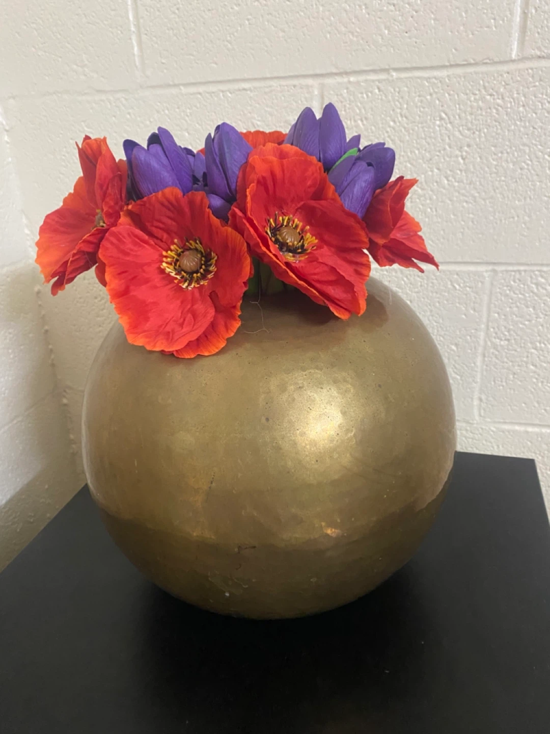 Vase with artificial flowers