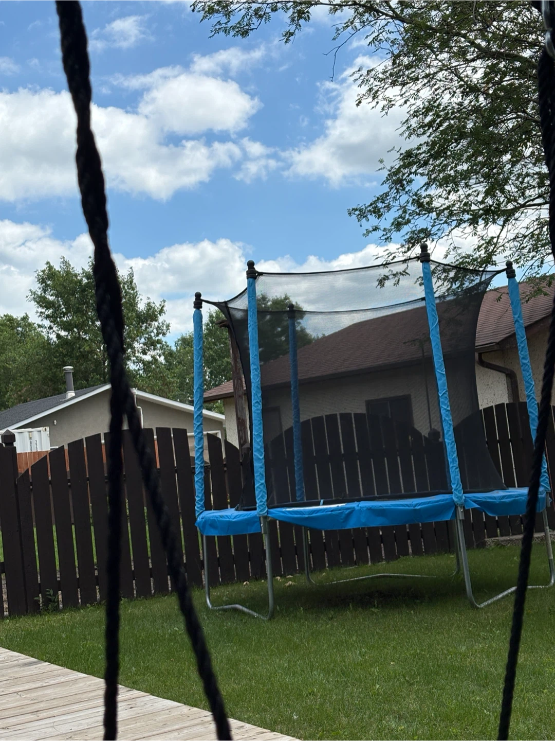 Blue Trampoline with Safety Net
