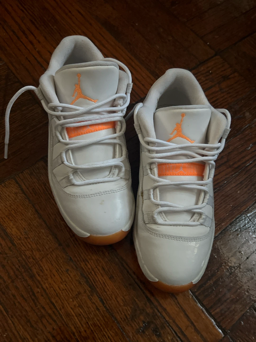 Air Jordan 11 Low White Orange Gum Sole Sneakers