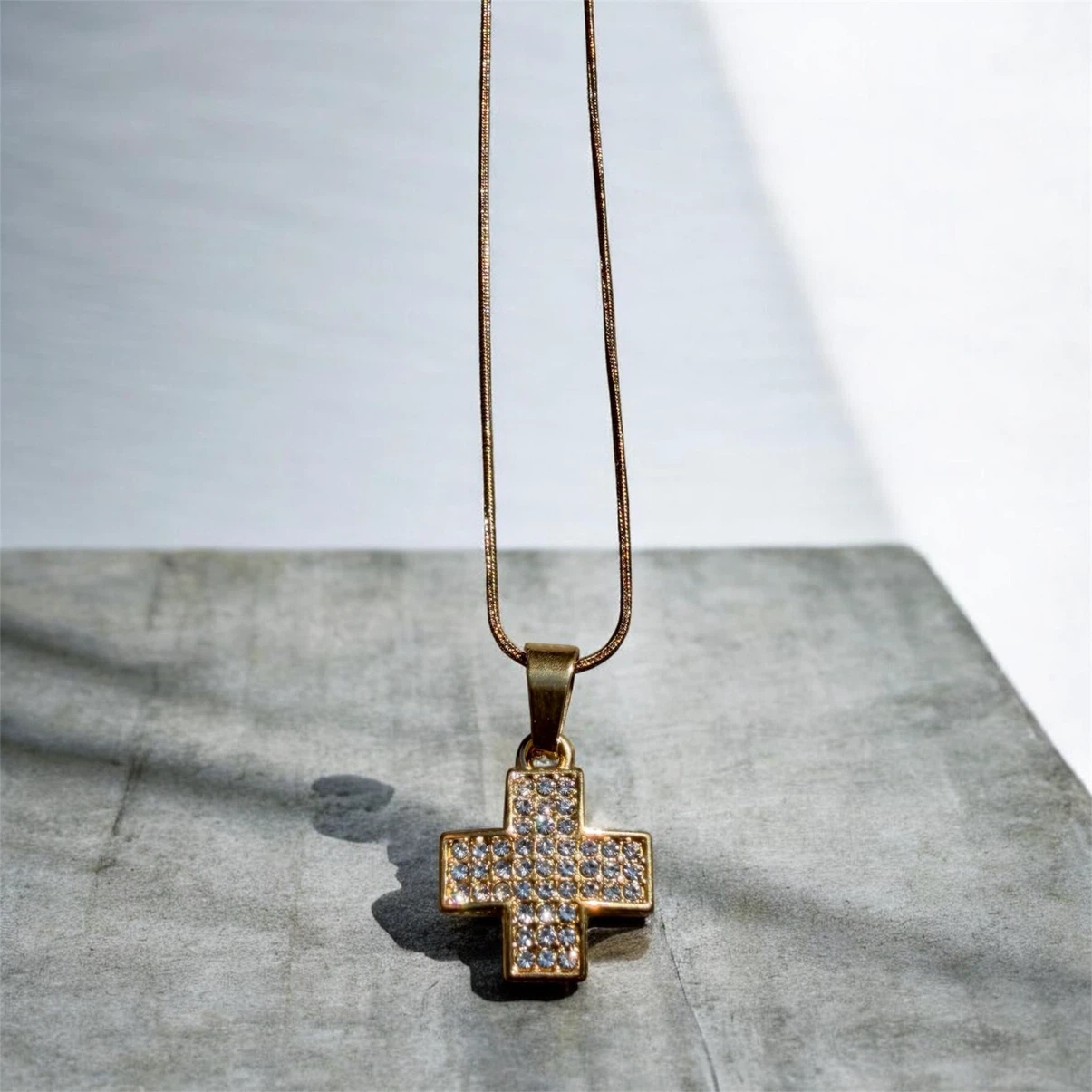 Gold-tone Cross Pendant Necklace with Rhinestones