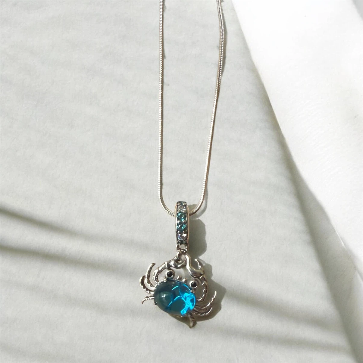 Silver Crab Pendant Necklace with Blue Gemstone