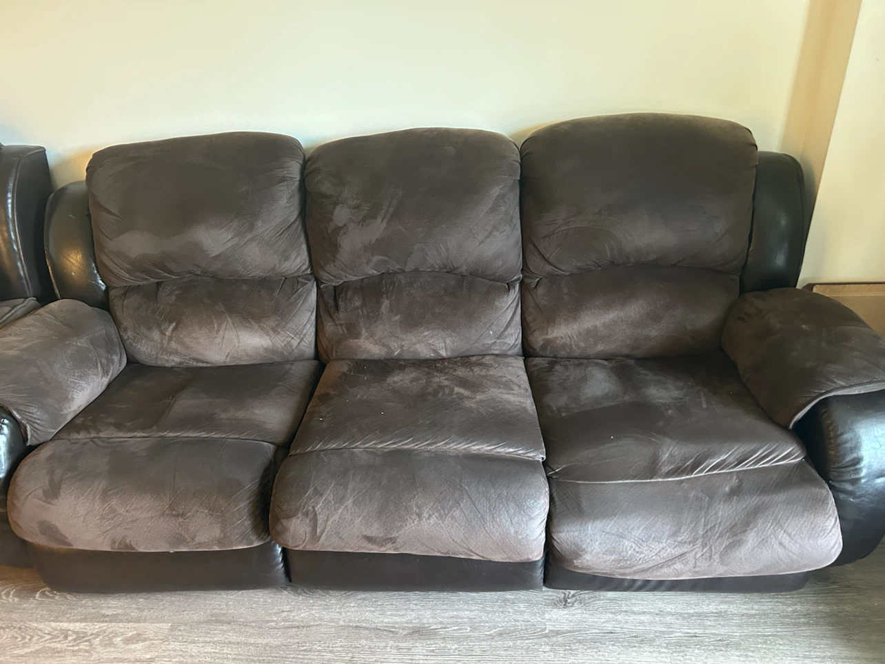 Brown reclining sofa