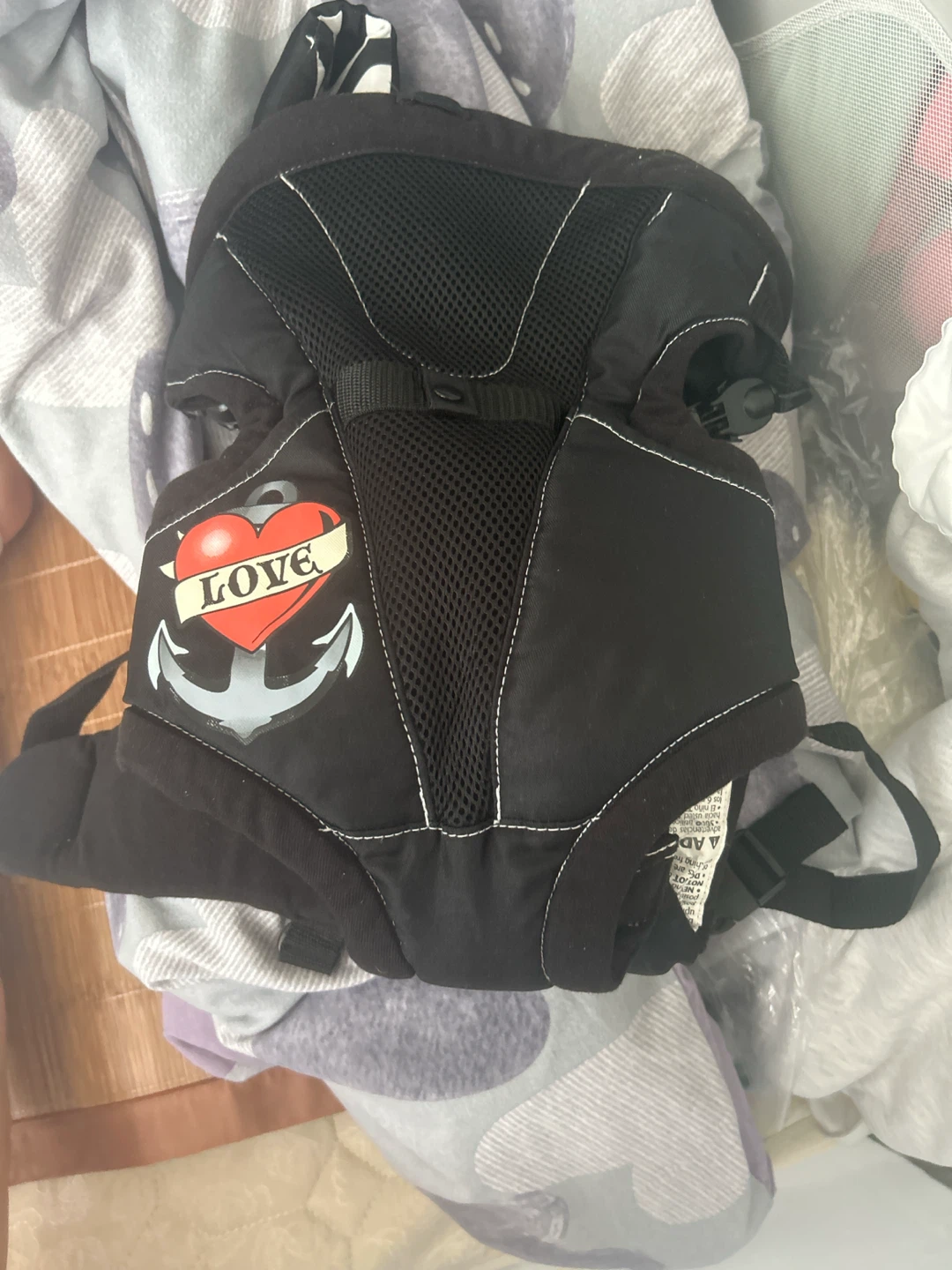 Black Baby Carrier with Anchor Heart Graphic