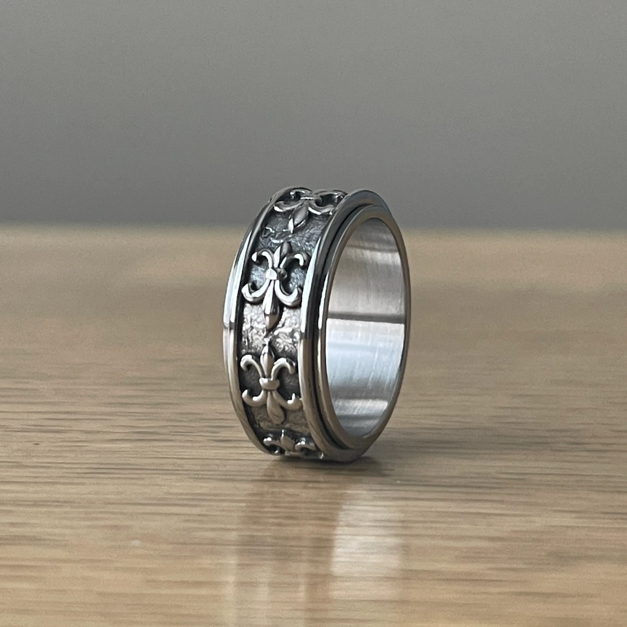 Fleur-de-Lis spinner “fidget” stainless steel ring (size 8.5)