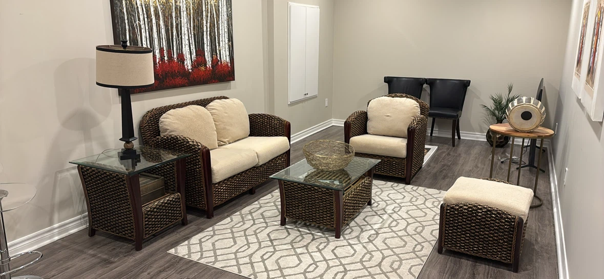 Wicker Loveseat with Beige Cushions