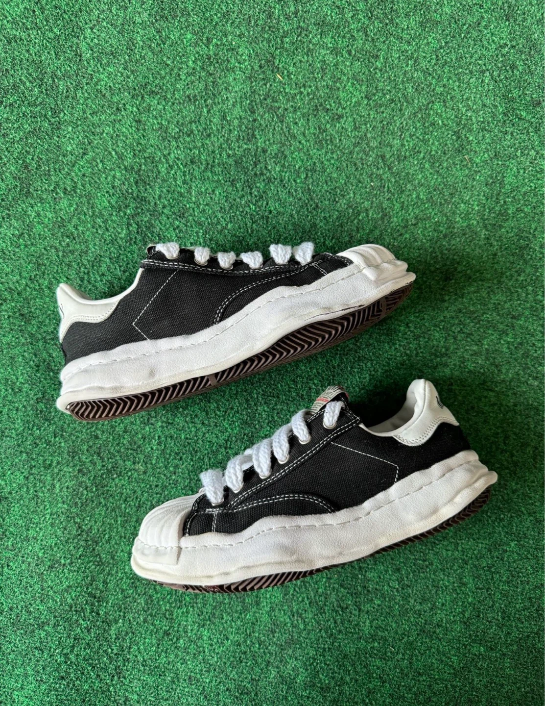 MMY Black and White Low Top Sneakers