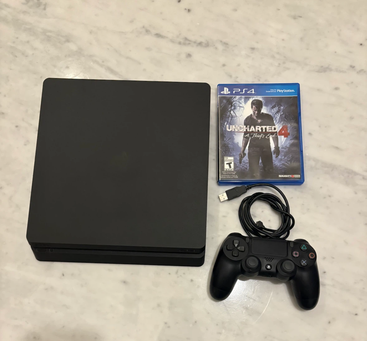 PlayStation 4 Slim Console with Uncharted 4