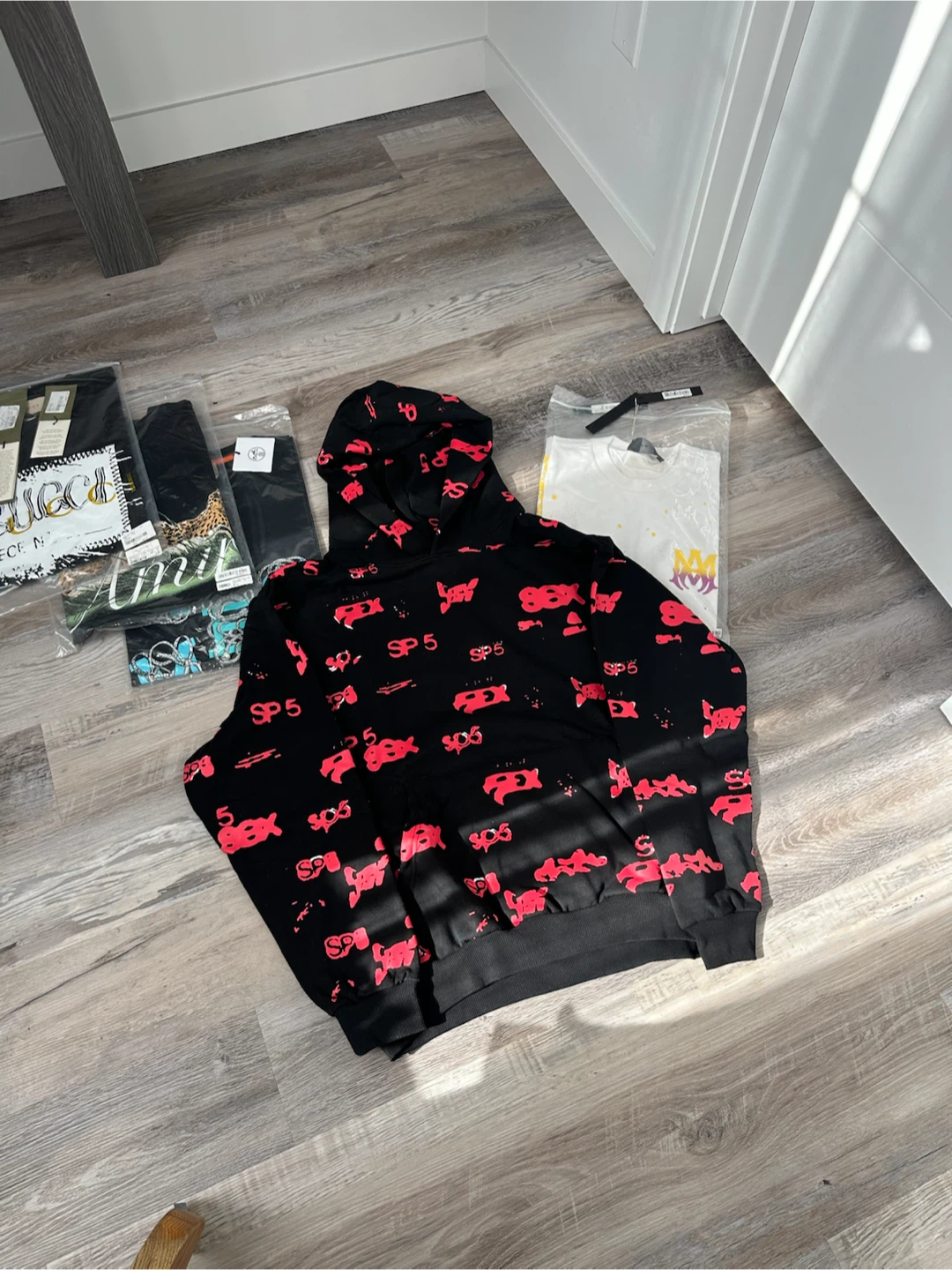 Black SP5 hoodie with red graphic print - photo 2