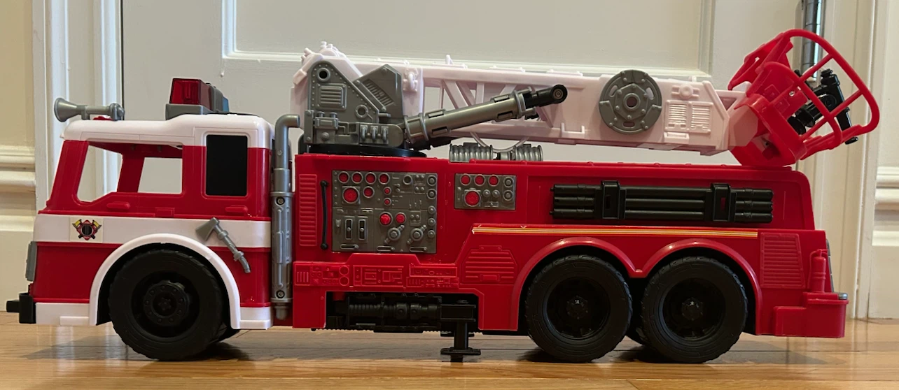 Toy Fire Truck with Extendable Ladder, 22’ long.