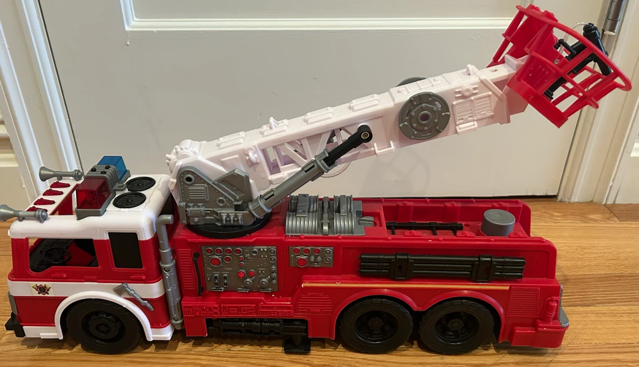 Toy Fire Truck with Extendable Ladder, 22’ long. - photo 3