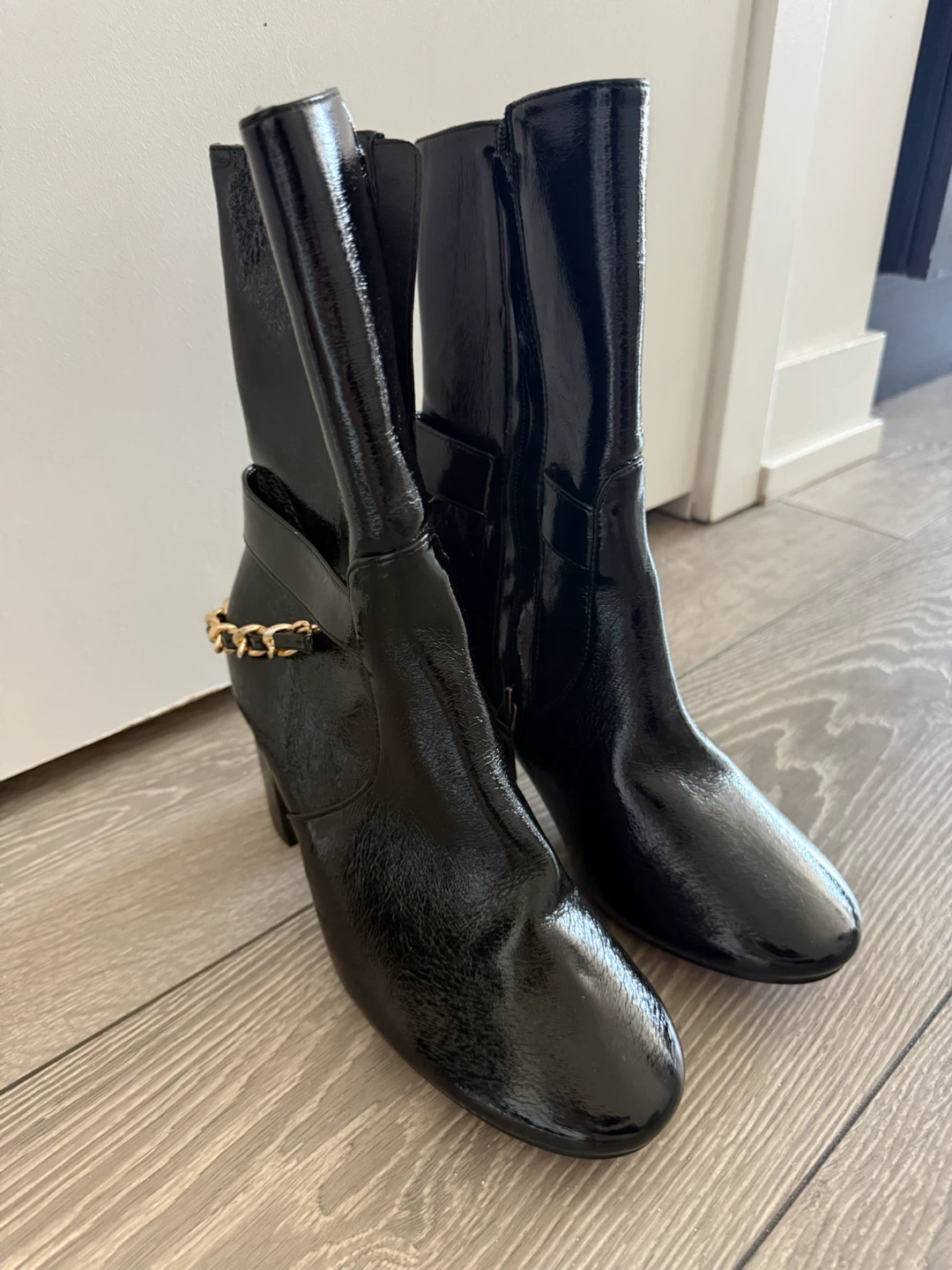 Black Leather Ankle Boots with Chain Detail