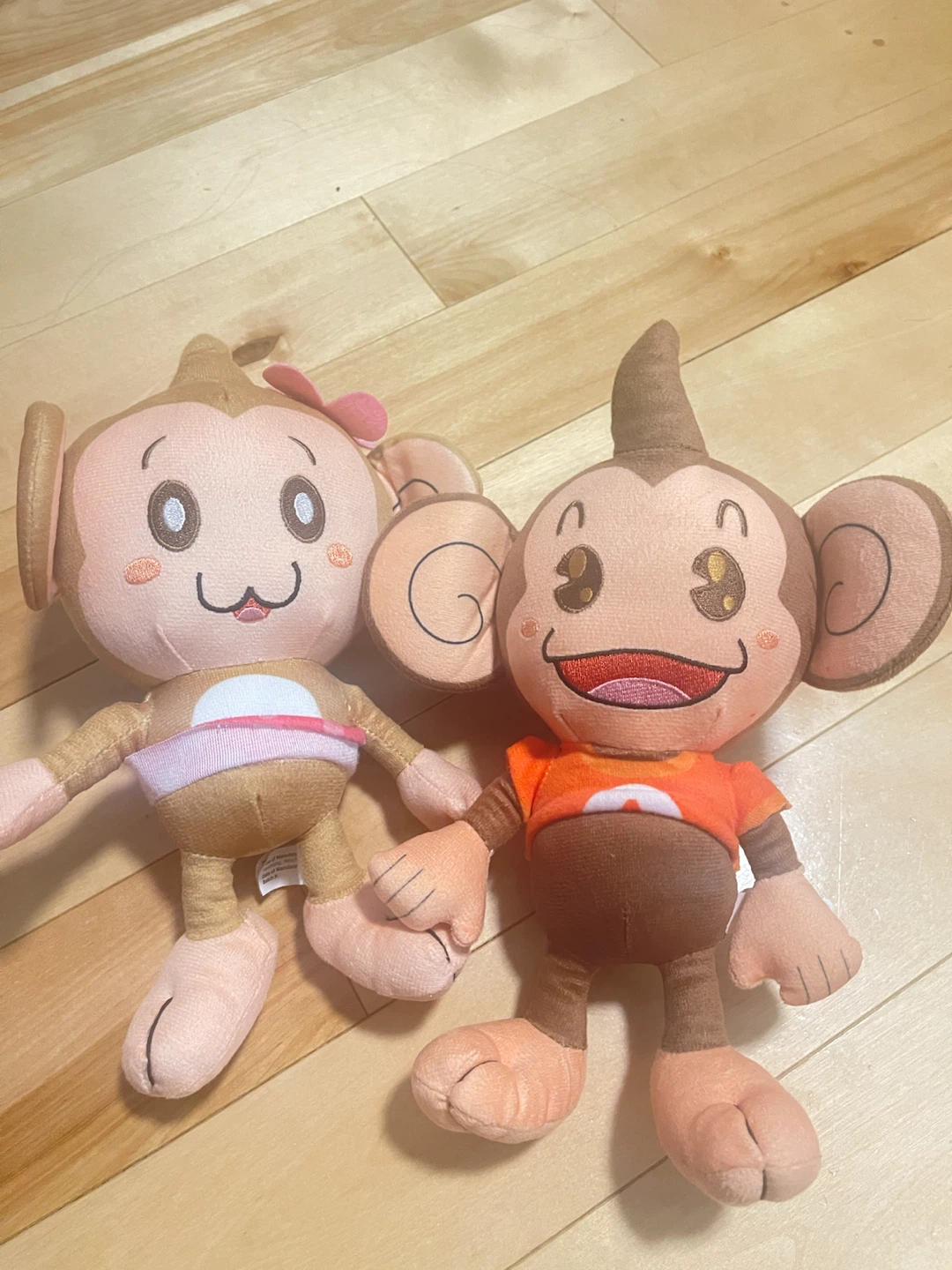 Two Monkey Plush Toys