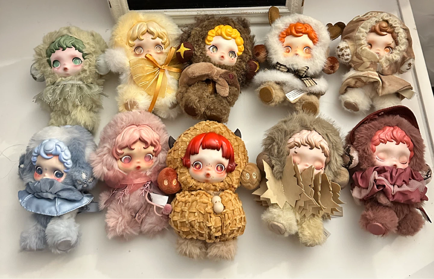 Collection of 10 "Skullpanda" Plush Dolls