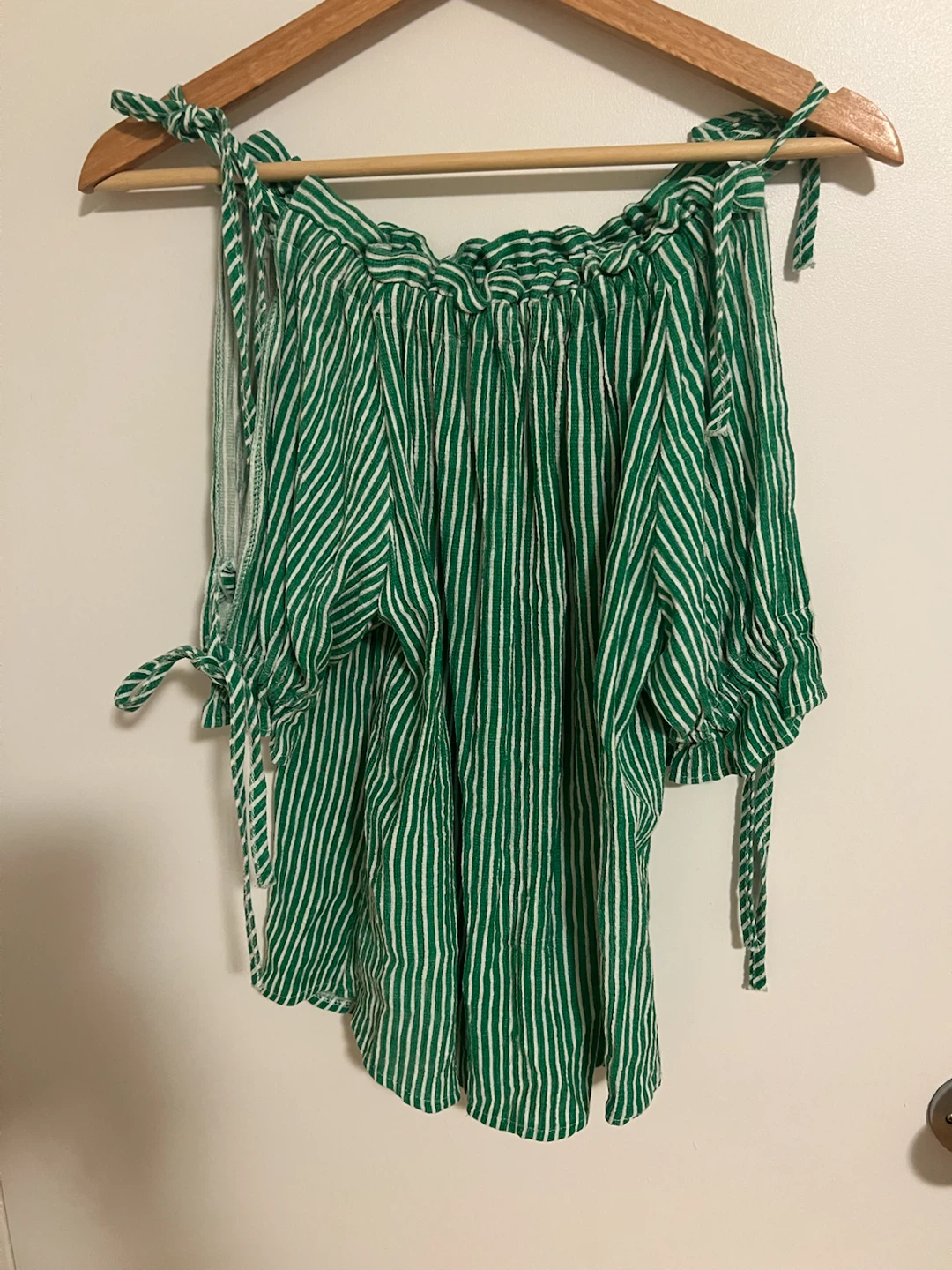 Green and white striped off-the-shoulder top