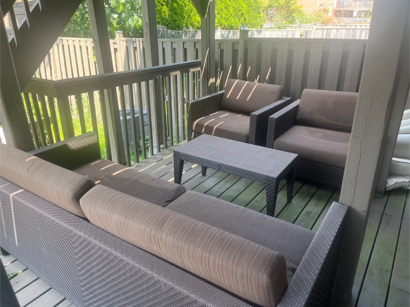 Wicker patio sofa set with coffee table