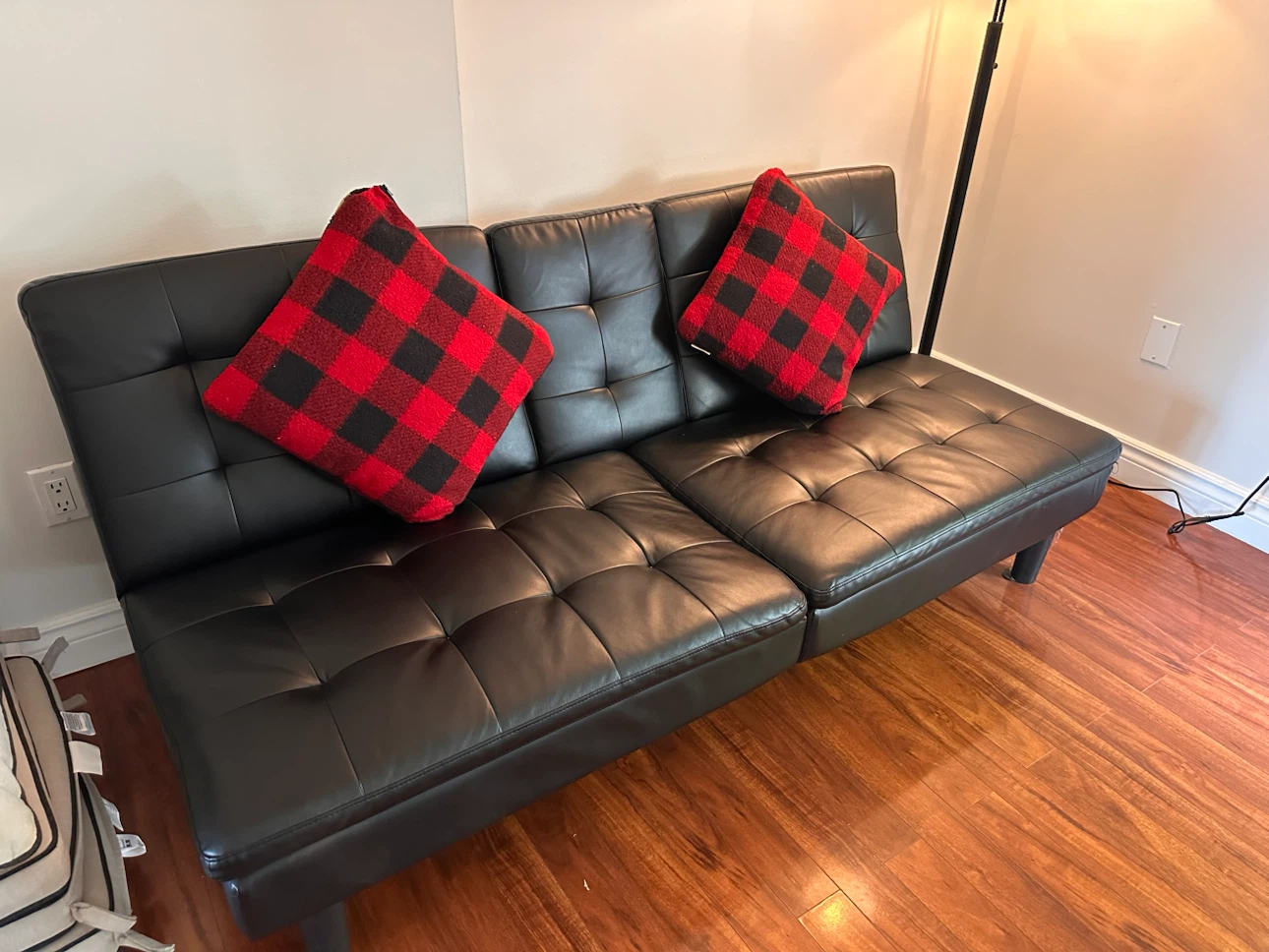 Black Faux Leather Futon Sofa Bed with Cup Holders