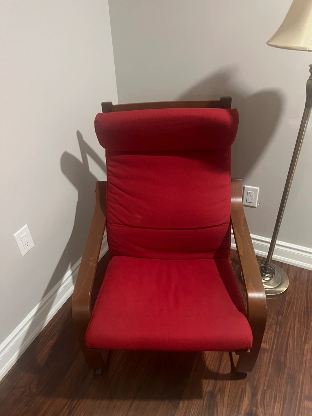 Red Upholstered Rocking Chair with Wooden Frame