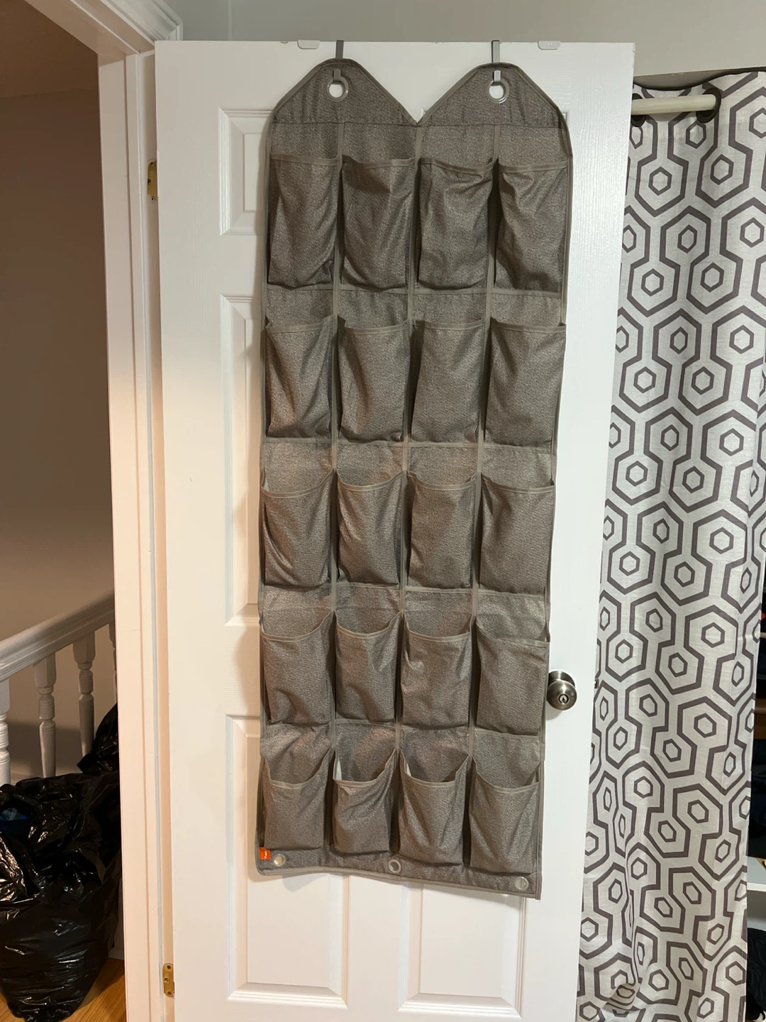 Over the door shoe holder