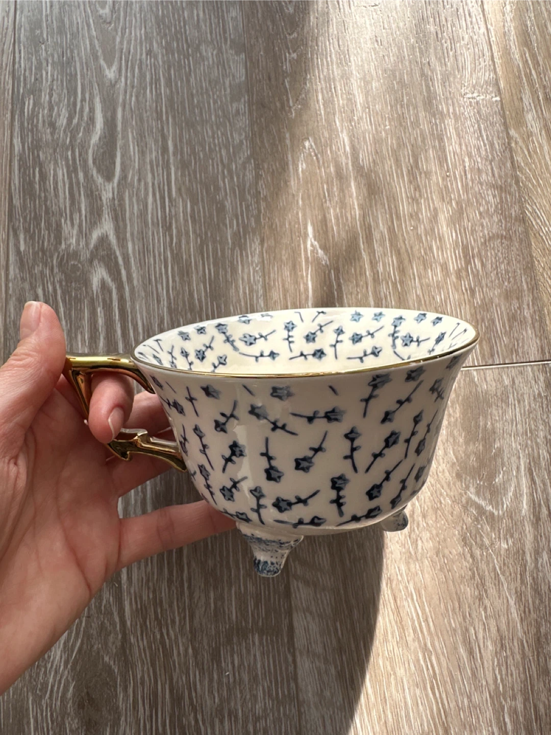 Decorative Teacup with Blue Floral Design