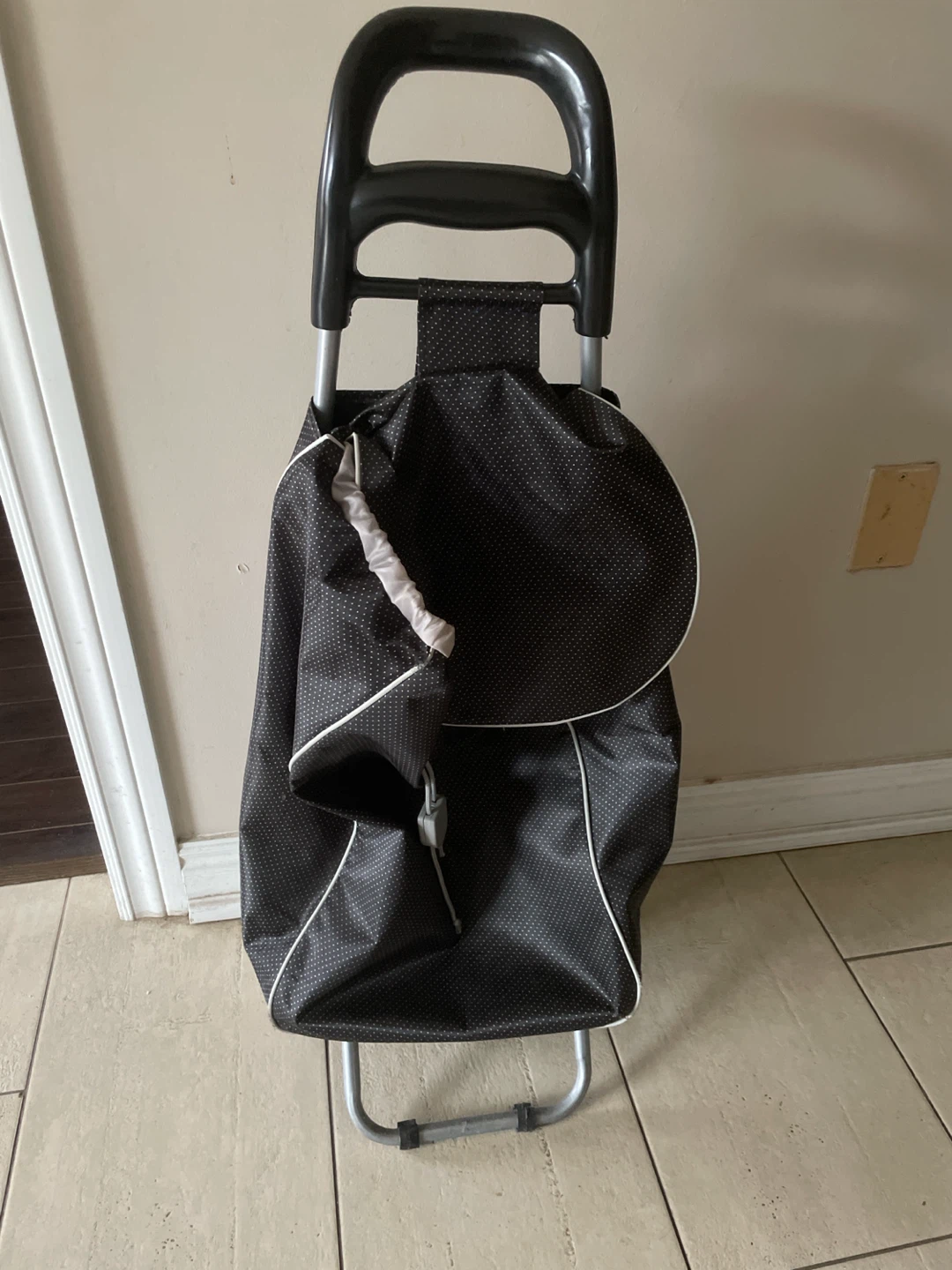 Black and white polka dot shopping trolley