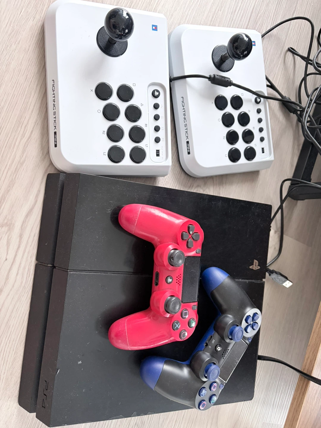 PlayStation 4 Console with Two Controllers and Fighting Sticks