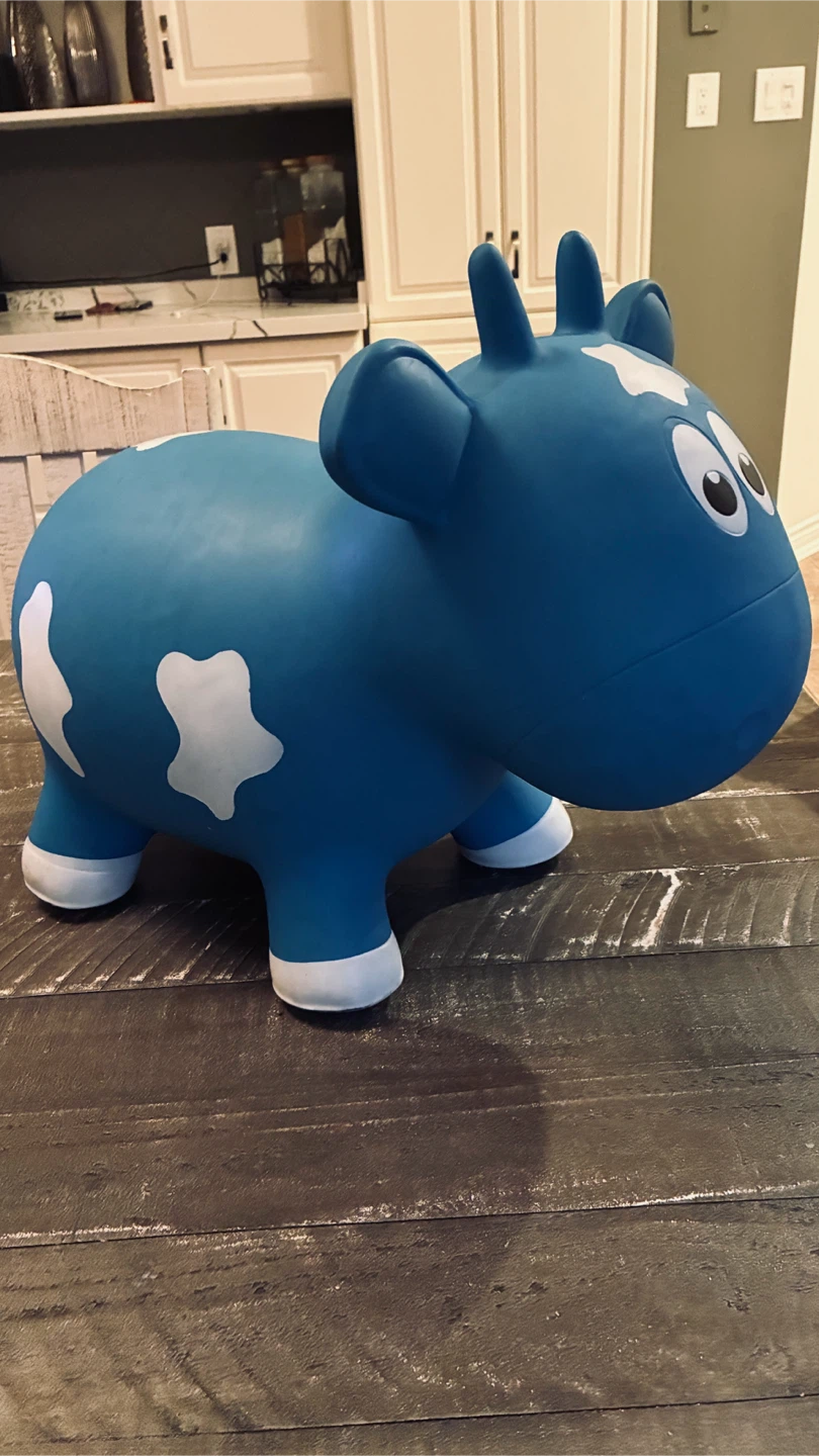 “Farm Hoppers” baby bouncing cow