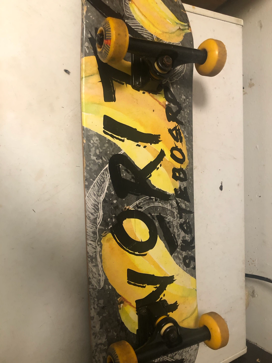 Skateboard with Banana Graphic