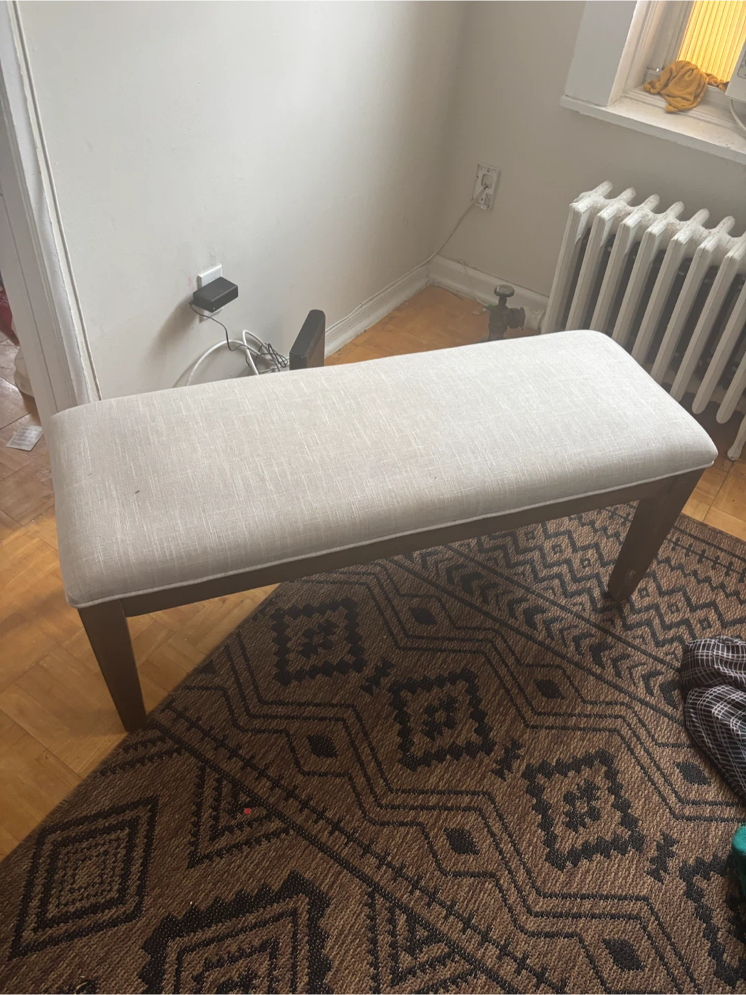 Beige and brown bench