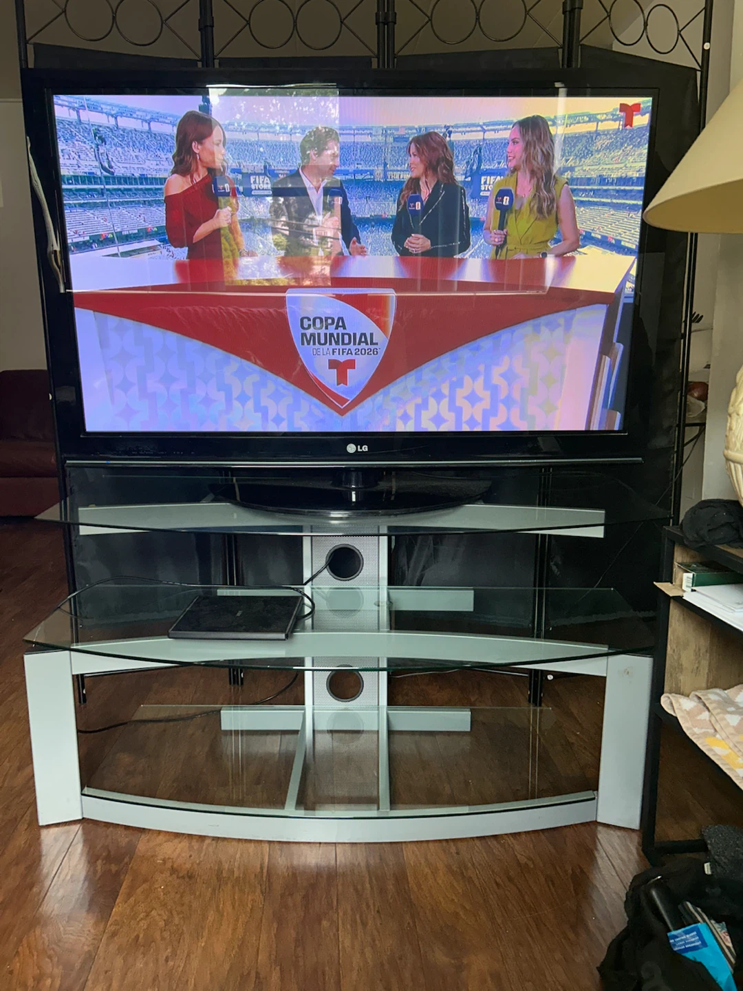 50"LG smart TV with 3 tier metal and temper glass TV table