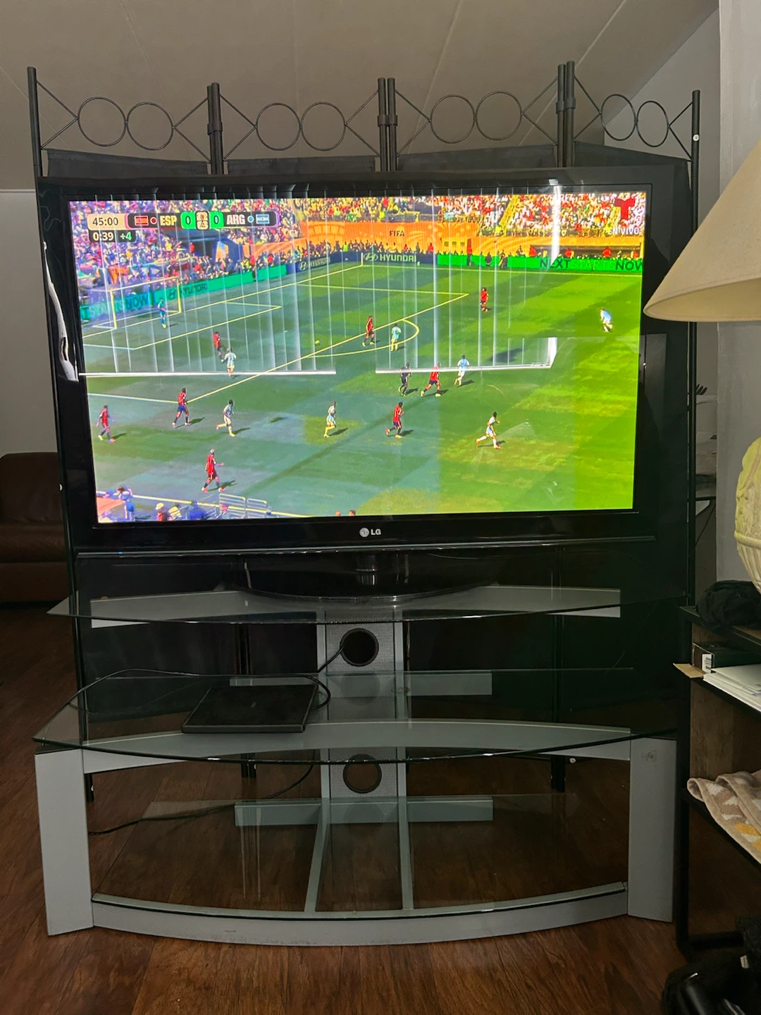 50"LG smart TV with 3 tier metal and temper glass TV table - photo 2