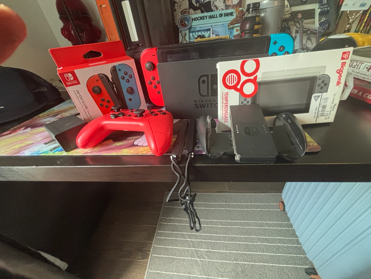 Nintendo Switch Console with Red Controller and Accessories