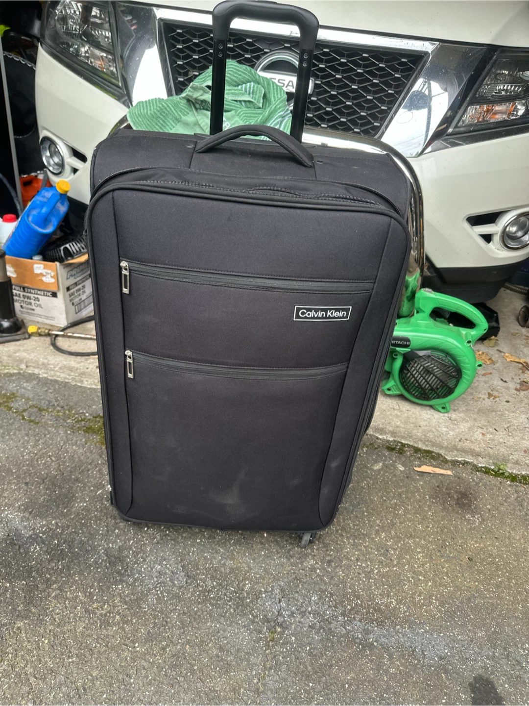 Calvin Klein checked luggage