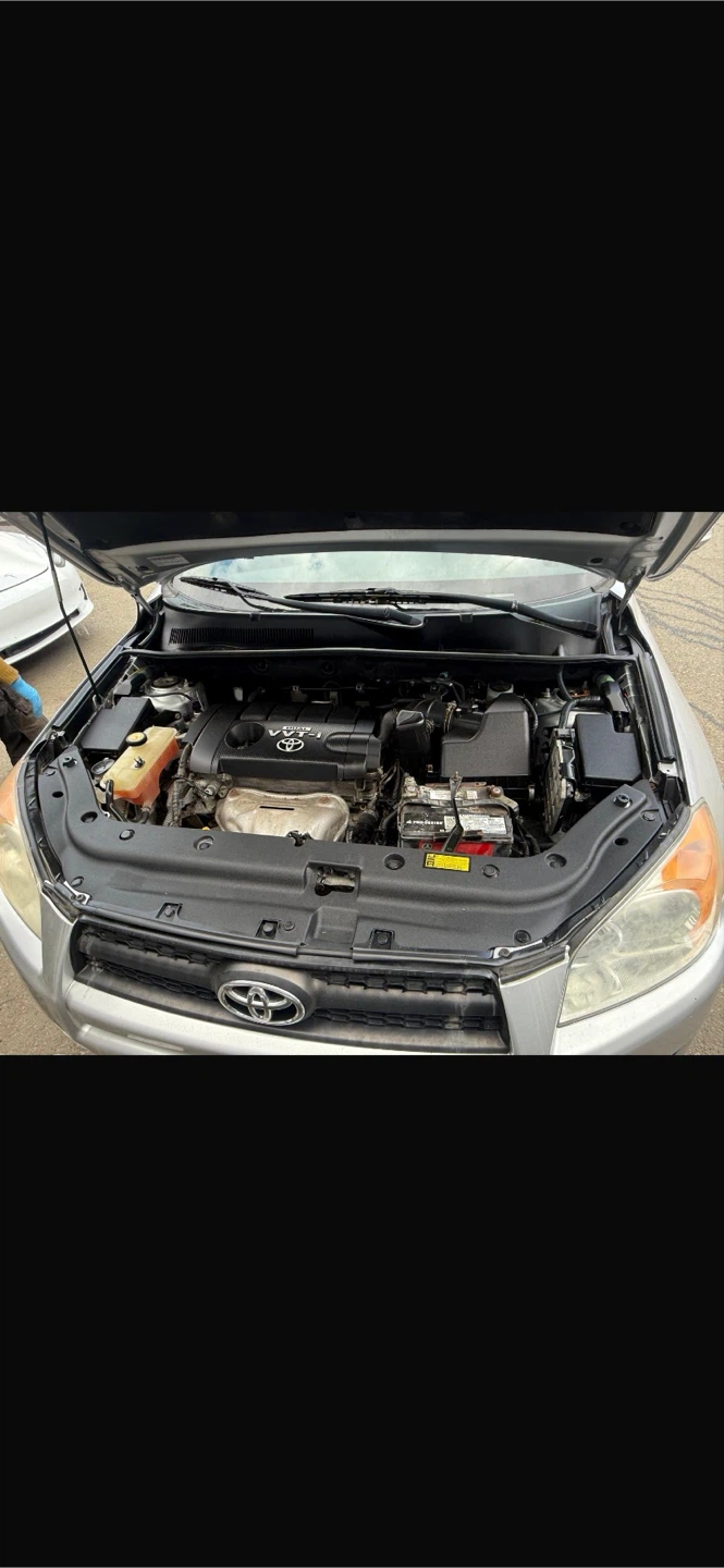 Silver Toyota RAV4 SUV - photo 2