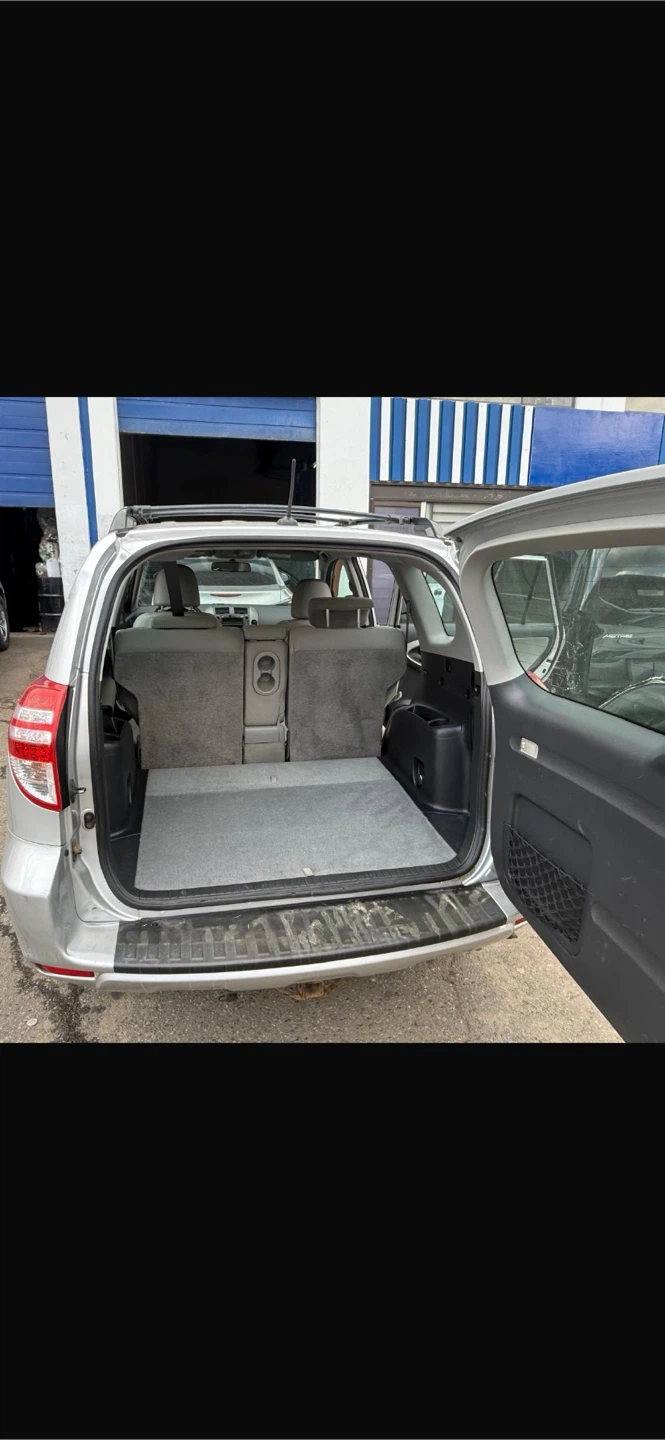 Silver Toyota RAV4 SUV - photo 3