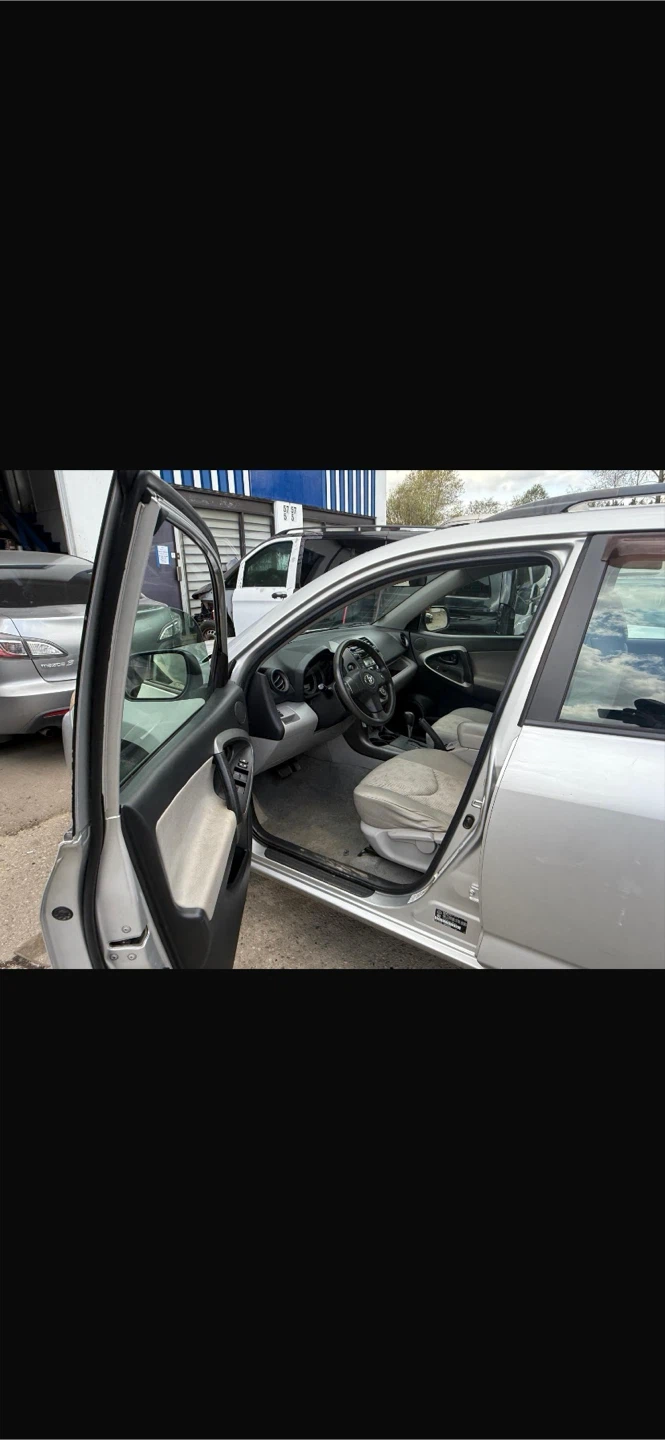 Silver Toyota RAV4 SUV - photo 5