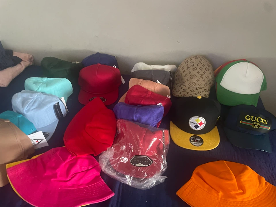 Assorted Baseball Caps and Bucket Hats