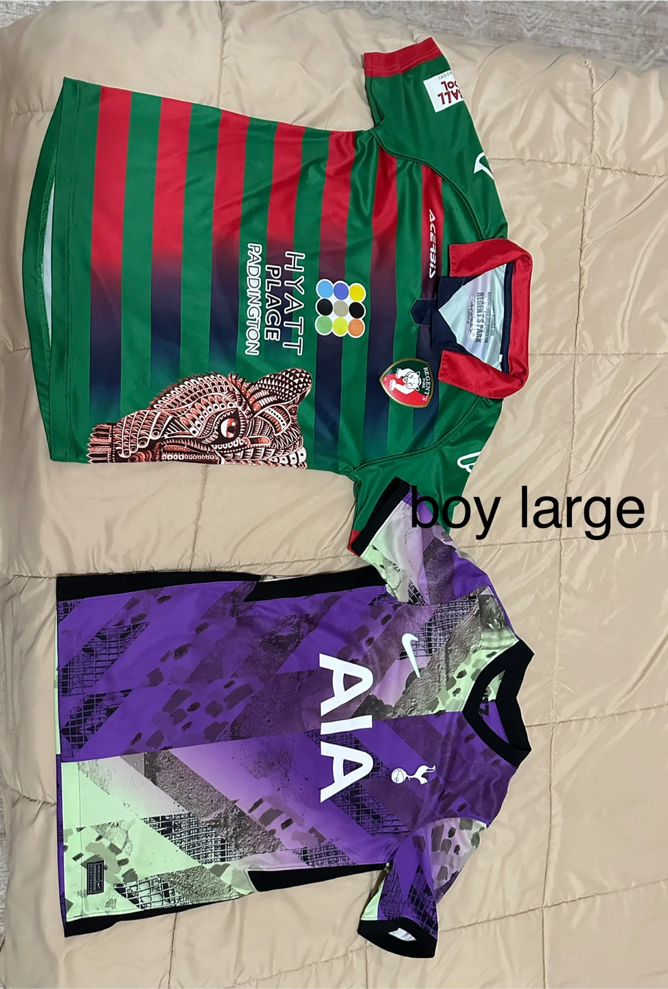 2 boy top size large both $3
