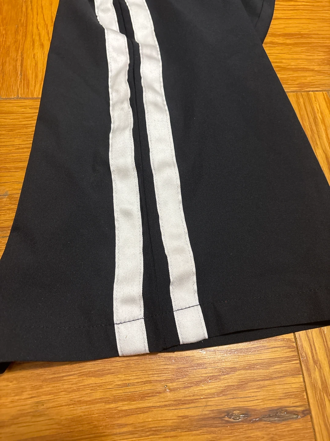 Black athletic shorts with white stripes - photo 2