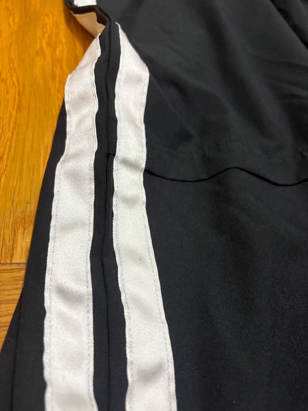 Black athletic shorts with white stripes - photo 3