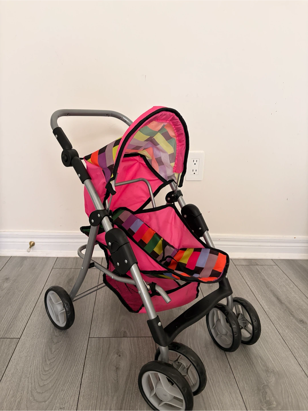 Brightly Coloured Doll Stroller