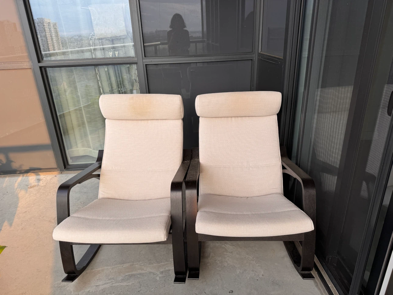 Pair of Beige Upholstered Rocking Chairs
