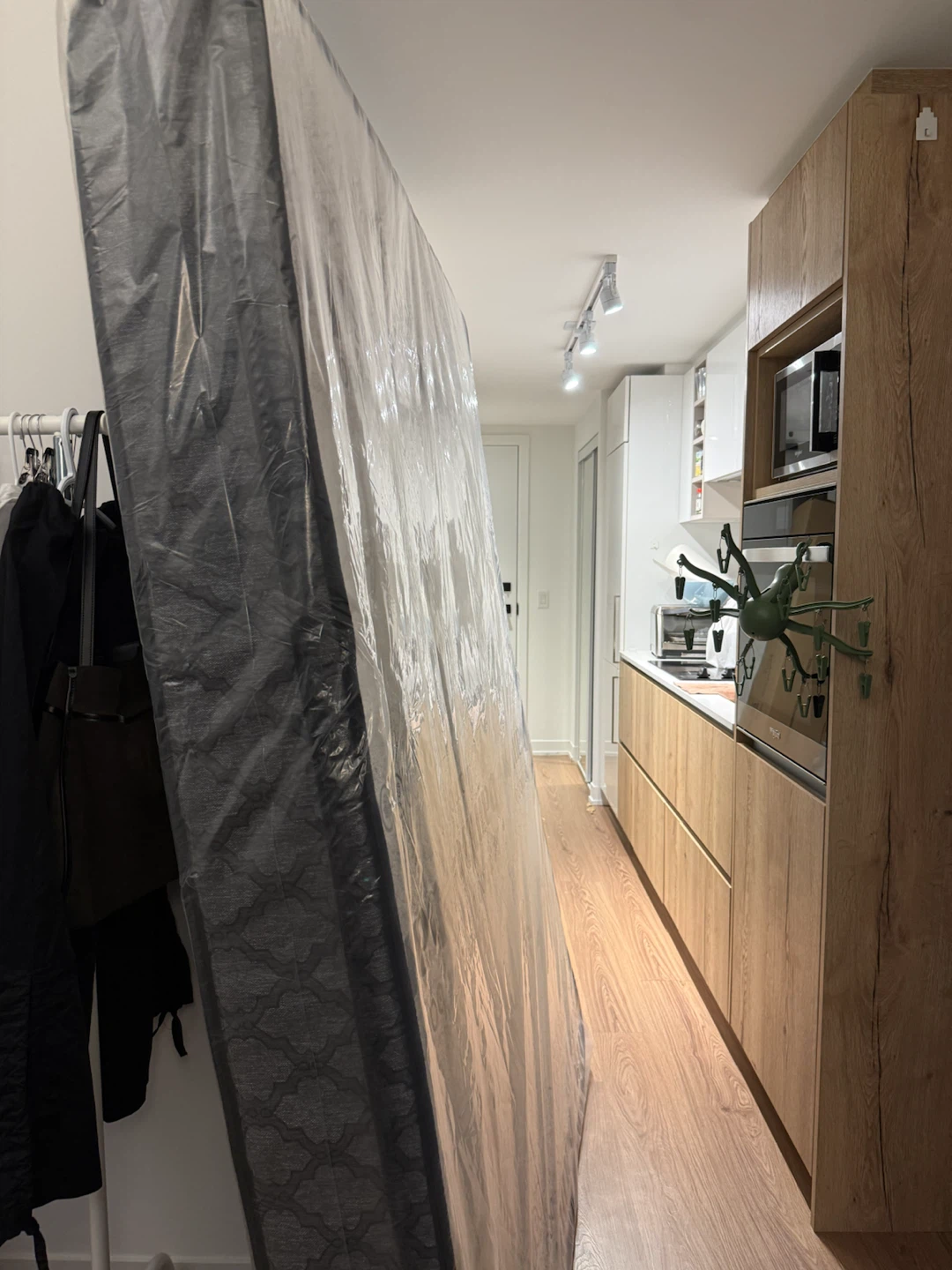 Queen size New Mattress in protective plastic wrap